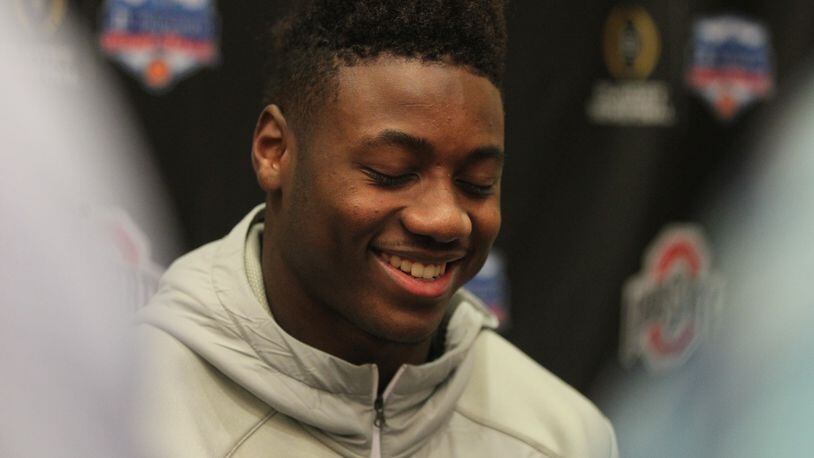 Curtis Samuel laughs as he answers a question Tuesday. David Jablonski/Staff