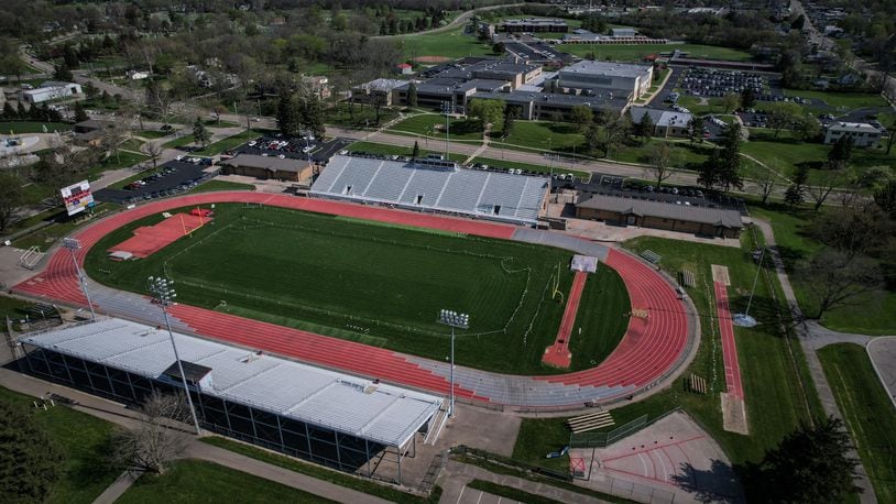 Troy Memorial Stadium's playing surface will be switched from grass to artificial turf in 2024. At the top right of the photo, behind Troy High School, is Ferguson Field, which will also be converted to turf. JIM NOELKER/STAFF