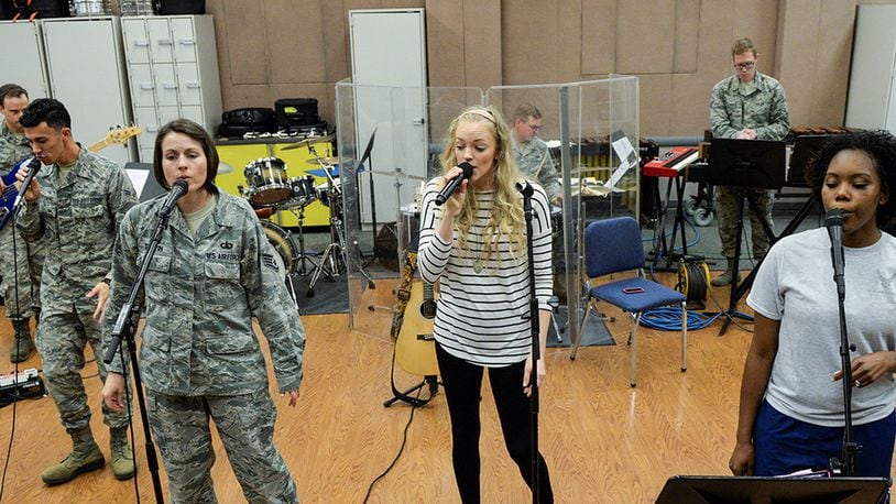 Singer Alexis Gomez rehearses with the U.S. Air Force Band of Flight inside the band’s offices at Wright-Patterson Air Force Base. Gomez will do a joint concert with the band Oct. 13 at the National Museum of the U.S. Air Force. (U.S. Air Force photos/Wesley Farnsworth)