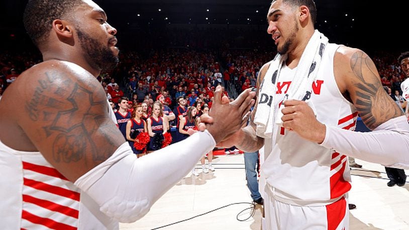 DAYTON, OH - MARCH 07: Obi Toppin #1 and Trey Landers #3 of the Dayton Flyers celebrate after the game against the George Washington Colonials at UD Arena on March 7, 2020 in Dayton, Ohio. Dayton defeated George Washington 76-51 and won the Atlantic 10 Conference regular season title. (Photo by Joe Robbins/Getty Images)