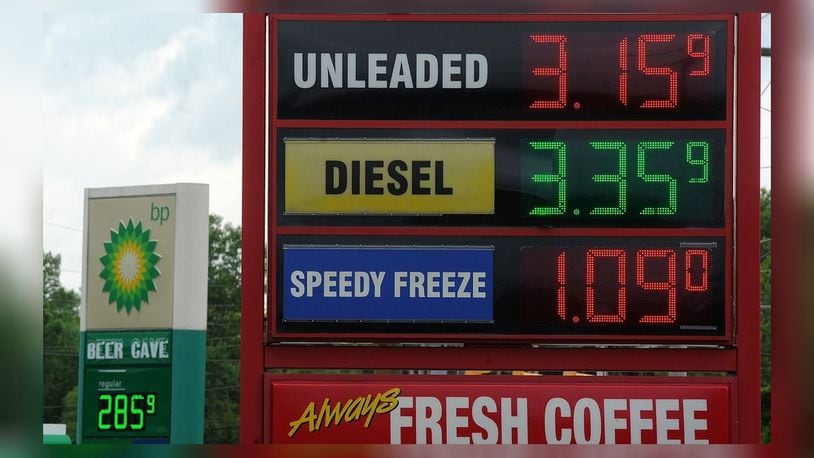 Gas prices go up on Monday, June 7, 2021. You can see a 30 cent difference between these two stations at the intersection of Burkhardt Road and Woodman Drive in Dayton. MARSHALL GORBY\STAFF