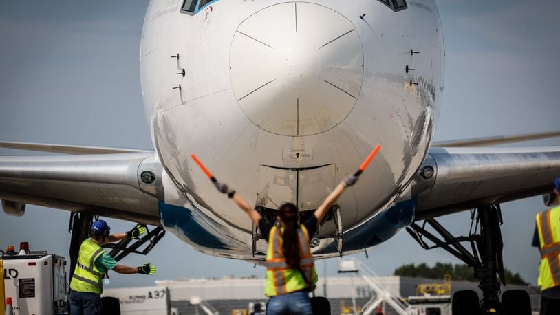 Amazon ground crews position a 767 cargo plan for offload at the Wilmington Air Park in July 2021. JIM NOELKER/STAFF