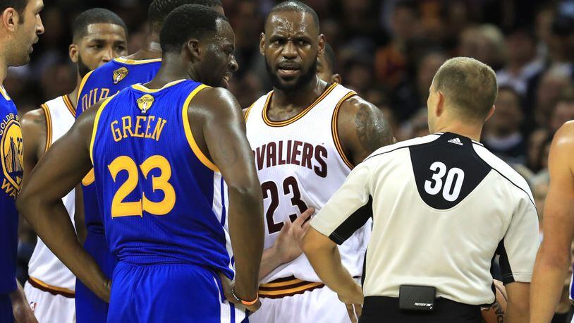 CLEVELAND, OH - JUNE 09:  LeBron James #23 of the Cleveland Cavaliers and Kevin Durant #35 of the Golden State Warriors speak after a foul in the third quarter in Game 4 of the 2017 NBA Finals at Quicken Loans Arena on June 9, 2017 in Cleveland, Ohio. NOTE TO USER: User expressly acknowledges and agrees that, by downloading and or using this photograph, User is consenting to the terms and conditions of the Getty Images License Agreement.  (Photo by Ronald Martinez/Getty Images)