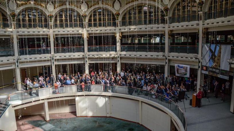 Dayton Mayor Nan Whaley speaks to a large crowd at a recent event where the state awarded the Dayton Arcade project $5 million in historic tax credits. TOM GILLIAM / STAFF