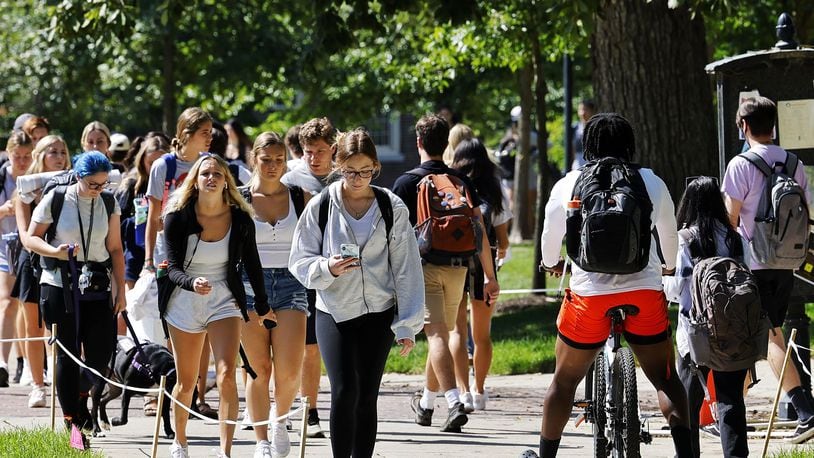 Students walk on campus between classes at Miami University Aug. 24, 2022 in Oxford. NICK GRAHAM/STAFF