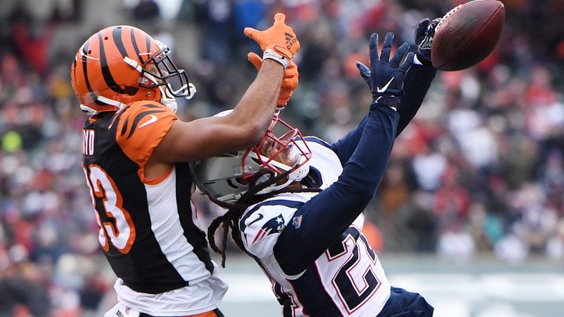 CINCINNATI, OHIO - DECEMBER 15: Stephon Gilmore #24 of the New England Patriots breaks up a pass intended for Tyler Boyd #83 of the Cincinnati Bengals during the second half in the game at Paul Brown Stadium on December 15, 2019 in Cincinnati, Ohio. (Photo by Bobby Ellis/Getty Images)