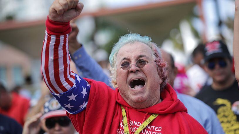 Supporters of Republican presidential nominee Donald Trump cheer during a campaign rally at Bayfront Park Amphitheater November 2, 2016 in Miami, Florida. With just days before Election Day in the United States, Trump and his opponent, Democratic presidential nominee Hillary Clinton, are campaigning in key battleground states that each must win to take the White House. (Photo by Chip Somodevilla/Getty Images)