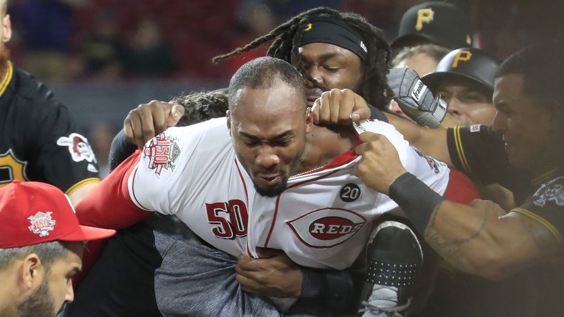 Amir Garrett of the Cincinnati Reds engages members of the Pittsburgh Pirates during a bench clearing altercation in the 9th inning of the game at Great American Ball Park on July 30, 2019 in Cincinnati, Ohio. (Photo by Andy Lyons/Getty Images)