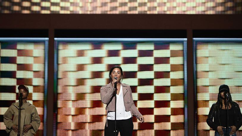 PHILADELPHIA, PA - JULY 25: Demi Lovato performs on stage for a sound check prior to the start of the first day of the Democratic National Convention at the Wells Fargo Center, July 25, 2016 in Philadelphia, Pennsylvania. An estimated 50,000 people are expected in Philadelphia, including hundreds of protesters and members of the media. The four-day Democratic National Convention kicked off July 25. (Photo by Jessica Kourkounis/Getty Images)