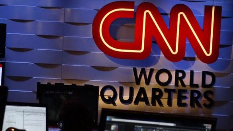 CNN is part of the Time Warner empire. RODNEY HO / RHO@AJC.COM