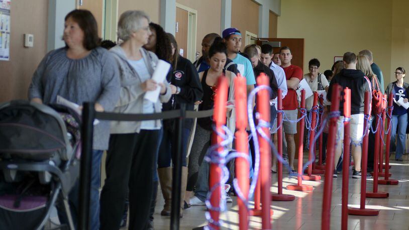 More than 7.86 million Ohioans were registered to vote in the 2016 presidential election this past November. Ohio Secretary of State Jon Husted believes we could see a significant increase in that number by the 2020 election. Pictured are voters waiting in line to cast an early ballot on Sunday, Nov. 6, 2016, just one day before early voting ended for the 2016 presidential election.
