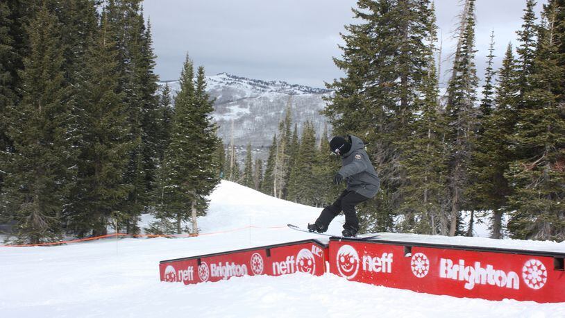 Jared Winkler, Communications Director at Brighton, shows off his skills in one of the resort&apos;s terrain parks.WINA STURGEON/TNS)
