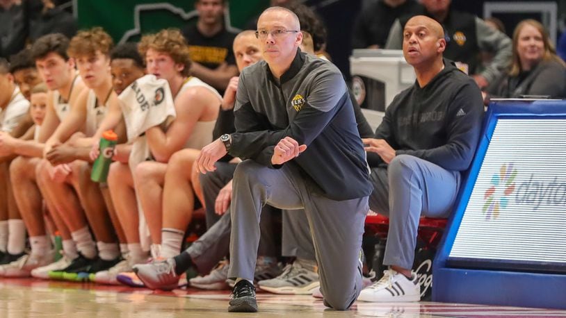 Centerville High School coach Brook Cupps talked after Saturday's loss in the state semifinal at UD Arena about important his son's leadership was to the success of the Elks the past three years. CONTRIBUTED PHOTO BY MICHAEL COOPER