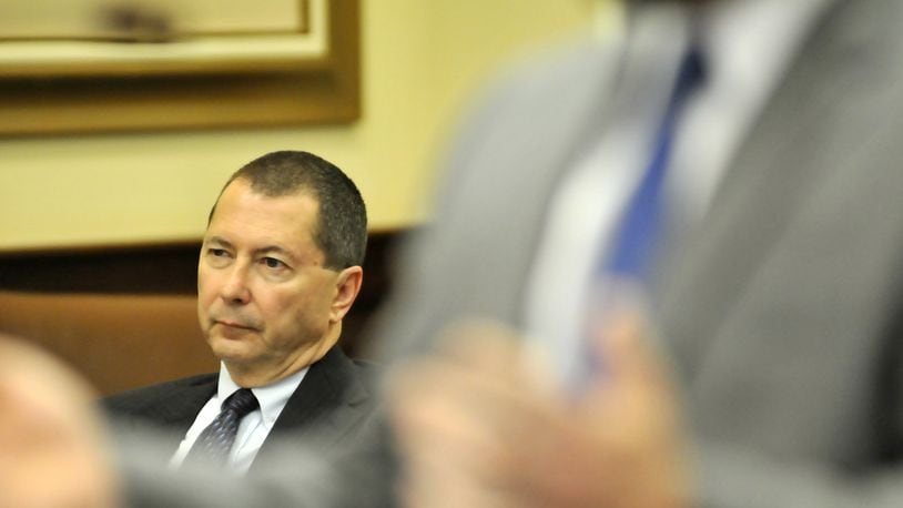 As the plaintiffs in the civil suit against former state lamaker Pete Beck seek donations his campaign made to OHROC, Beck is in the midst of appealing his 2015 13-count criminal conviction. Pictured is Beck listens to cross-examination testimony on May 20, 2015, as his defense attorney Chad Ziepfel, foreground, questions a witness.