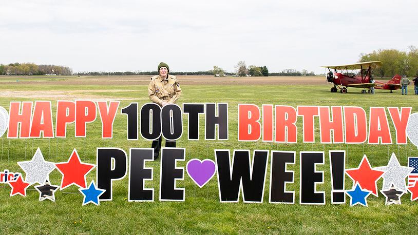 World War II veteran Jim “Pee Wee” Martin, poses for a photo during a 100th birthday celebration held in his honor April 23 in Xenia, Ohio. Martin served as a paratrooper assigned to 101st Airborne Division, 506th Infantry Regiment, G Company, out of Fort Campbell, Kentucky. U.S. AIR FORCE PHOTO/WESLEY FARNSWORTH
