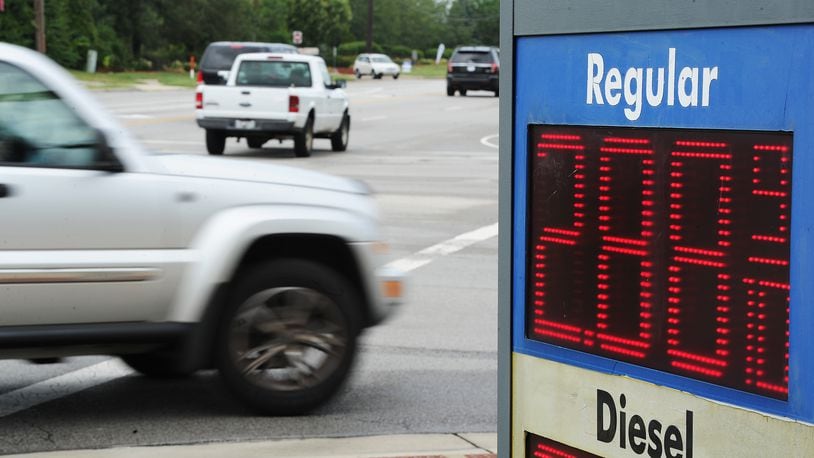 Traffic moves along Woodman Ave. in Kettering, Tuesday Aug. 31, 2021. Gas prices are likely to increase for the Labor Day holiday due to hurricane Ida. MARSHALL GORBY\STAFF