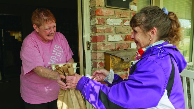 A Warren County resident receives a home delivered meal as part of the Elderly Services Program. CONTRIBUTED/COUNCIL ON AGING