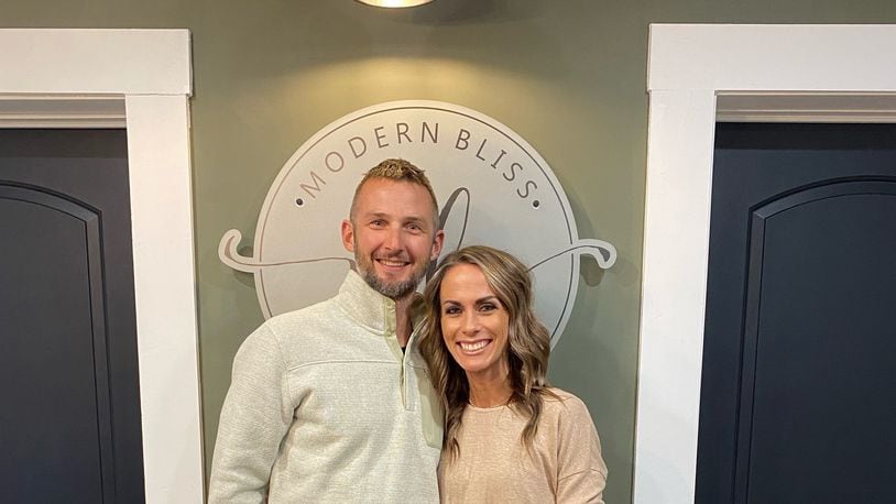 Tyler and Lindsi Stupp pose for a photo inside Modern Bliss Salon & Spa at 45 S. Main St. in downtown Miamisburg Saturday Nov. 14, 2020. Lindsi Stupp started the business this month after 15 years as a hair stylist. CONTRIBUTED