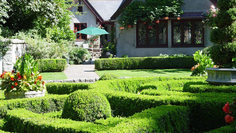 Larger estate properties require a high degree of skill for creating precise planting of parterres, where losses spoil the hedge design. (Maureen Gilmer/TNS)