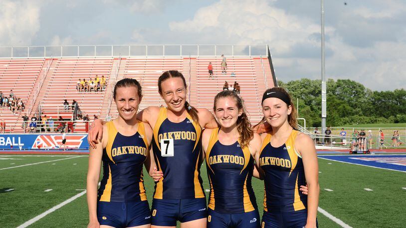 Oakwood’s 3,200-meter relay team of (l-r) senior Mary Kidwell, freshman Grace Hartman, junior Elizabeth Vaughn and junior Lily Eifert finished third at the Division II regional track and field meet qualify for next week’s state championships in Columbus. Greg Billing / Contributed