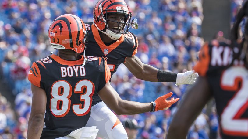 ORCHARD PARK, NY - AUGUST 26: John Ross #15 of the Cincinnati Bengals celebrates a touchdown reception with Tyler Boyd #83 during the first quarter of a preseason game against the Buffalo Bills at New Era Field on August 26, 2018 in Orchard Park, New York. (Photo by Brett Carlsen/Getty Images)