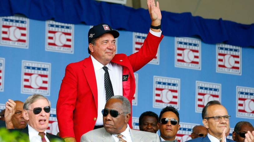 Reds Hall of FamerJohnny Bench is introduced during the Baseball Hall of Fame induction ceremony at Clark Sports Center on July 27, 2014 in Cooperstown, New York.  He was back again this past weekend, with his camera in tow, as former catcher Ivan "Pudge" Rodriguez was one of the latest inductees.