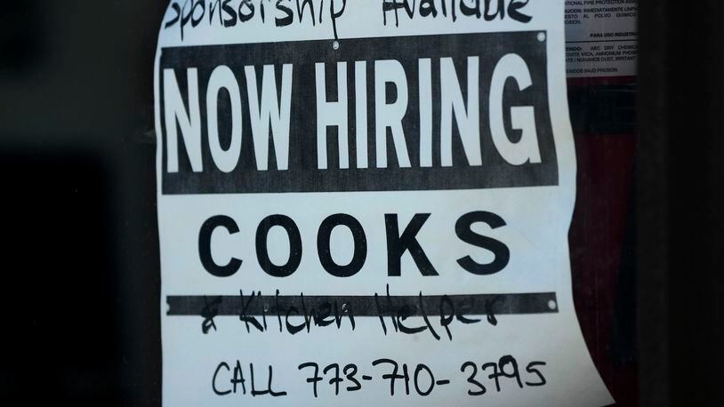 A hiring sign is displayed at a restaurant in Chicago, Monday, March 11, 2024. On Thursday, April 25, 2024, the Labor Department reports on the number of people who applied for unemployment benefits last week. (AP Photo/Nam Y. Huh)