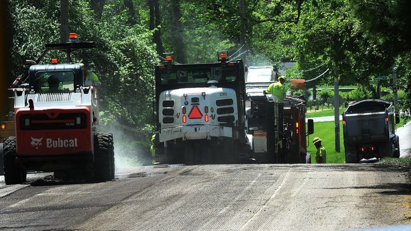 The John R. Jurgensen Company started paving work Wednesday, May 1, 2024, that will cover the entire length of Mad River Road, from David Road in Kettering, south through Miami Twp. to Ohio 725. MARSHALL GORBY\STAFF