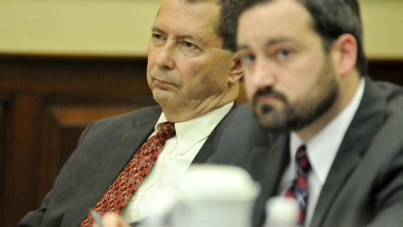 The First District Court of Appeals overturned 10 of 13 criminal counts against former state lawmaker Pete Beck. Pictured is Beck at the defense table with defense attorney Chad Ziepfel on May 26, 2015, during Beck’s criminal trial in a Hamilton County Common Pleas courtroom in Cincinnati.