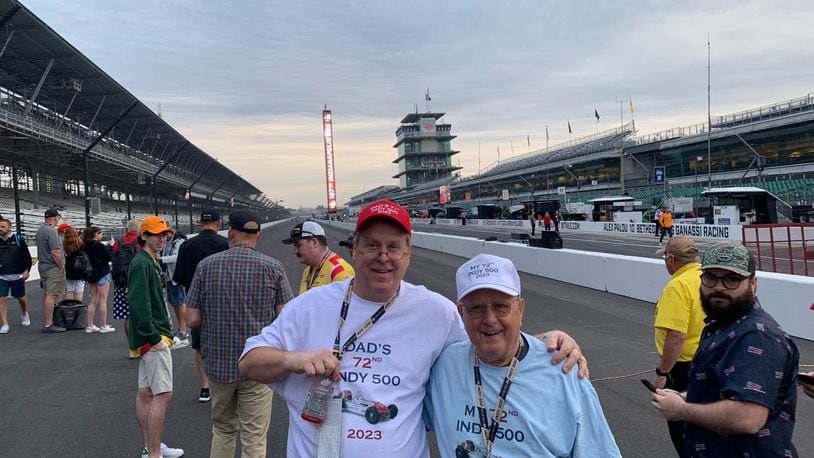 Greg (left) and Ed Gyenes on straightaway at the Indianapolis 500 on Sunday. CONTRIBUTED