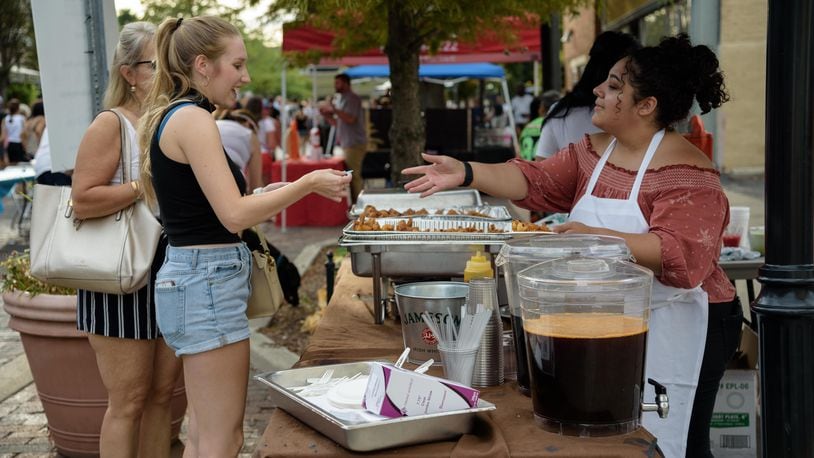 Sample your way through the Oregon District on Saturday, Sept. 17 from noon to 6 p.m. with the return of the Taste of the Oregon (File Photo). TOM GILLIAM / CONTRIBUTING PHOTOGRAPHER
