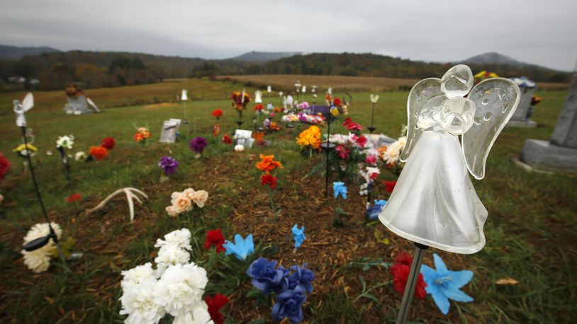 Gravesite of six of eight Rhoden Family members killed in rural Pike County  The three locations where the murders took place remain uninhabited six months after the execution style killings on April 22, 2016.  Investigators have released scant information and no clear motive has been revealed.  TY GREENLEES / STAFF