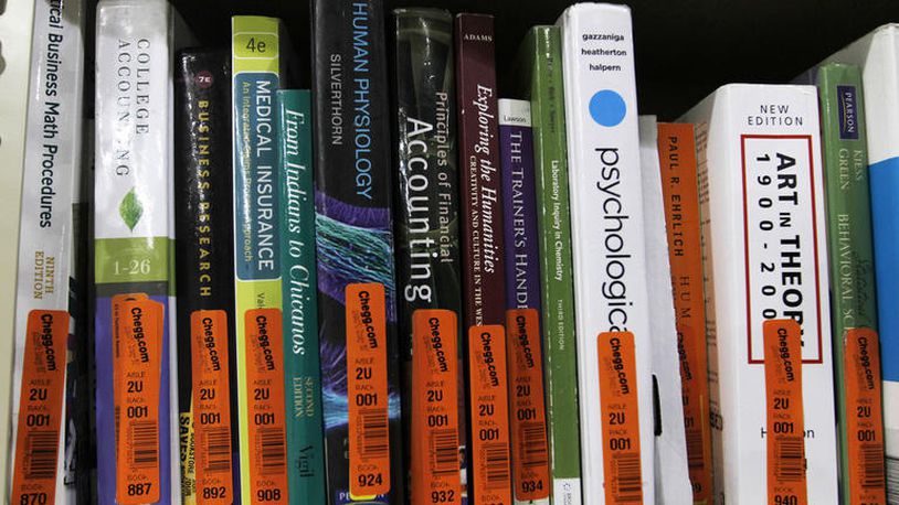 Textbooks sit on a shelf at the Chegg Inc. warehouse in Shepherdsville, Kentucky, U.S., on Thursday, April 29, 2010. No more $120 chemistry books. That’s the message from textbook-rental service Chegg Inc., which is urging college students to stop paying top dollar to buy their tomes. Photographer: John Sommers II/Bloomberg via Getty Images