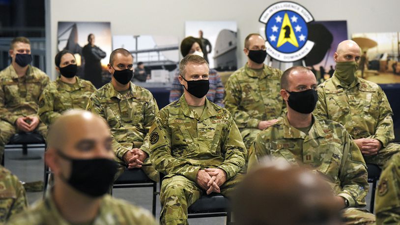 U.S. Air Force personnel with the 18th Intelligence Squadron await deactivation of their squadron and activation of the 73rd Intelligence, Surveillance and Reconnaissance Squadron under the command of Lt. Col. Nathaniel A. Peace, U.S. Space Force Sept. 3. (U.S. Air Force photo/Ty Greenlees)