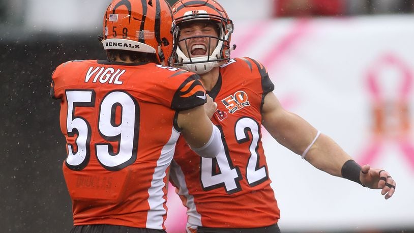 CINCINNATI, OH - OCTOBER 8:  Nick Vigil #59 of the Cincinnati Bengals congratulates Clayton Fejedelem #42 of the Cincinnati Bengals after making a defensive stop during the first quarter of the game against the Buffalo Bills at Paul Brown Stadium on October 8, 2017 in Cincinnati, Ohio. (Photo by John Grieshop/Getty Images)