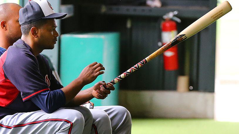 Braves infielder Elmer Reyes waits to bat in the batting tunnels during spring training on Sunday, March 1, 2015, in Lake Buena Vista, Fla. CURTIS COMPTON / CCOMPTON@AJC.COM