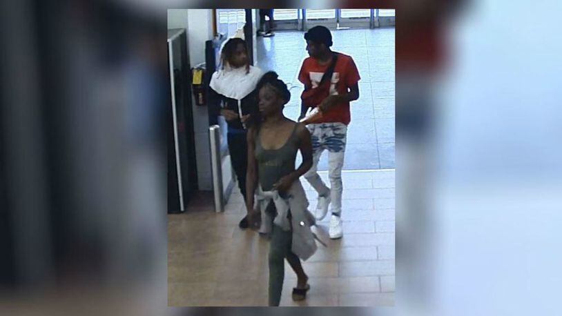 DeKalb police have released surveillance photos of three people of interest in an alleged hate-motivated shooting and robbery of a gay Decatur man earlier this month. (Photo: Dekalb County Police Department)