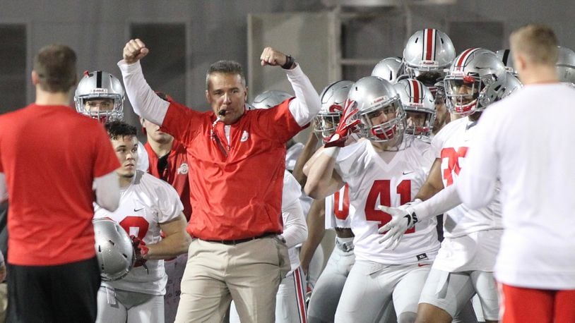 Ohio State coach Urban Meyer reacts as the Buckeyes break a huddle during spring practice on Tuesday, March 7, 2017, at the Woody Hayes Athletic Center in Columbus. David Jablonski/Staff