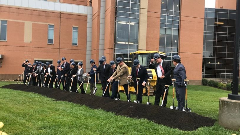 Kettering Health officials break ground on a new 170,000 square-foot tower at Soin Medical Center on Sept. 10, 2018. KAITLIN SCHROEDER/STAFF