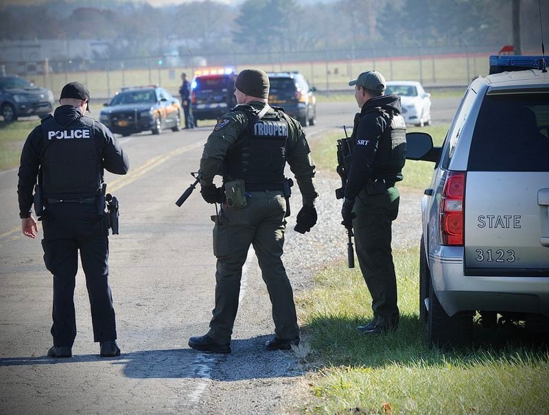 Ohio State Highway Patrol officers, the Greene and Clark sheriffs, and the Huber Heights Fire Department and Police Department searched Haddix Road for a stolen truck and suspect on Tuesday, November 30, 2021.  MARSHALL GORBY / STAFF
