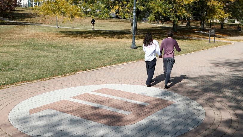 Students walk across campus at the Wittenberg University. Bill Lackey/Staff