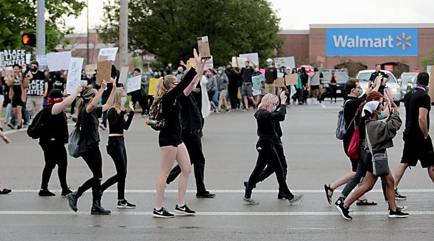 PHOTOS: Demonstrators rally for justice in Beavercreek