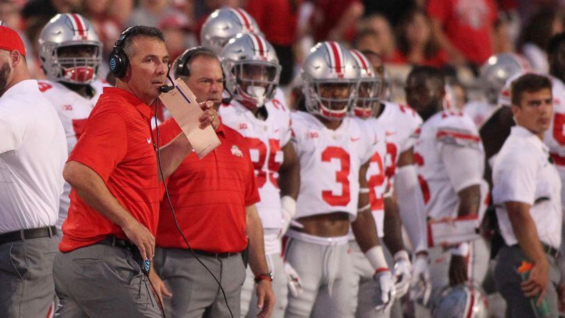 Ohio State’s Urban Meyer watches the action against Indiana on Thursday, Aug. 31, 2017, at Memorial Stadium in Bloomington, Ind. David Jablonski/Staff
