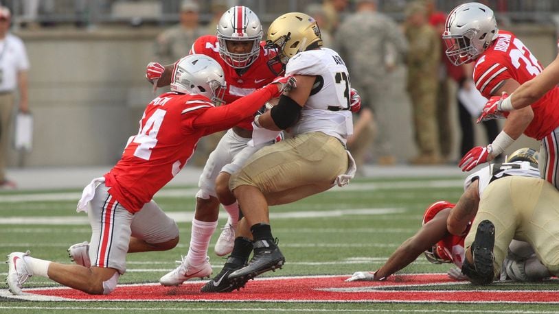 Ohio State’s Erick Smith makes a tackle against Army on Saturday, Sept. 16, 2017, at Ohio Stadium in Columbus. David Jablonski/Staff