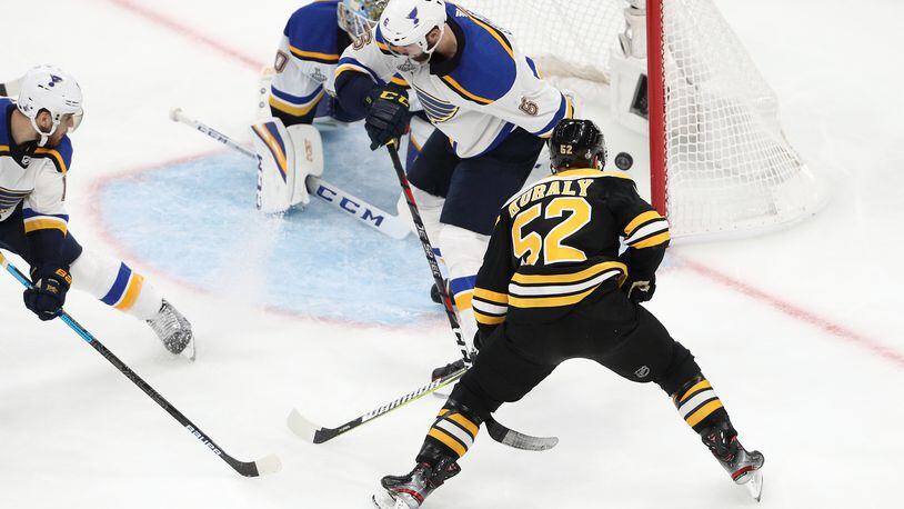 BOSTON, MASSACHUSETTS - MAY 27: Sean Kuraly #52 of the Boston Bruins scores a third period goal past Jordan Binnington #50 of the St. Louis Blues in Game One of the 2019 NHL Stanley Cup Final at TD Garden on May 27, 2019 in Boston, Massachusetts. (Photo by Patrick Smith/Getty Images)