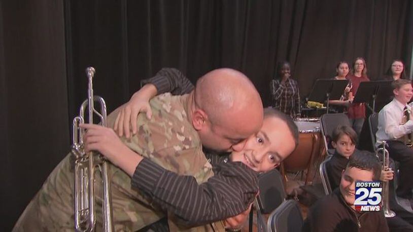 Alex Carrion Jr. was surprised by his father after  his deployment. Their reunion was met with cheers from the crowd.
