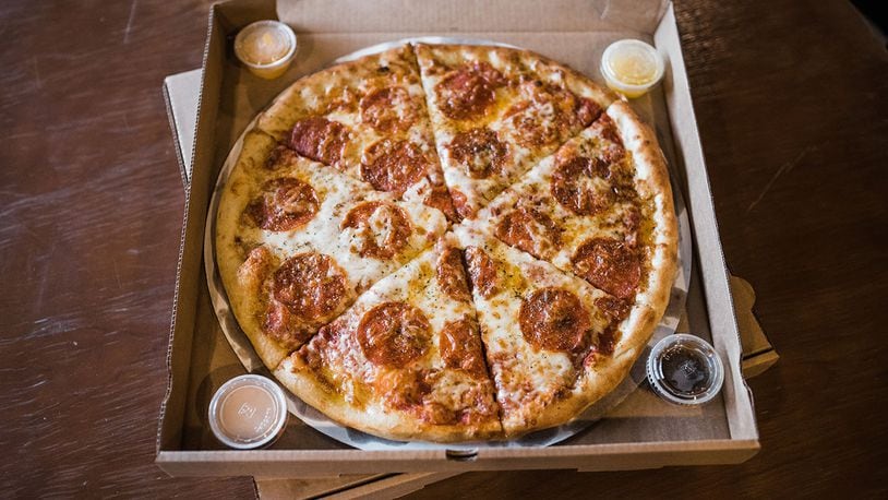 The Great Charity Pizza Catering Auction held at The Yellow Cab Tavern on at 1 p.m. today will give attendees the opportunity to bid on pizza, pizza box art and Pizza Bandit catering packages, with all proceeds benefiting The Foodbank Inc. CONTRIBUTED/CHELSEA HALL
