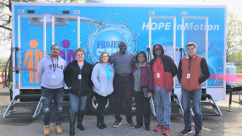 Miami Valley Housing Opportunities (MVHO) staff pictured at the launch of a recent homeless outreach program, Project Clean. CONTRIBUTED