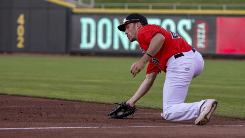 Dayton first baseman Alex McGarry fields a ground ball during a recent game. Jeff Gilbert/CONTRIBUTED