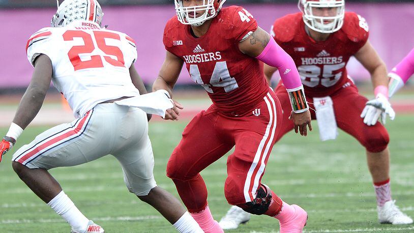 Indiana University linebacker Marcus Oliver (44) eyes Ohio State running back Bri’onte Dunn during Big Ten Conference play Oct. 3 in Bloomington, Ind. PHOTO COURTESY OF INDIANA UNIVERSITY ATHLETICS